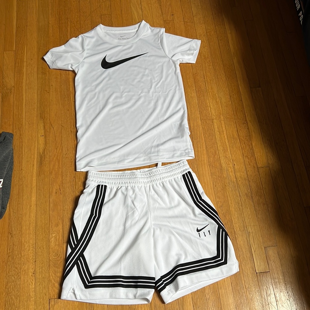 Nike outfit shirt size small, shorts size medium